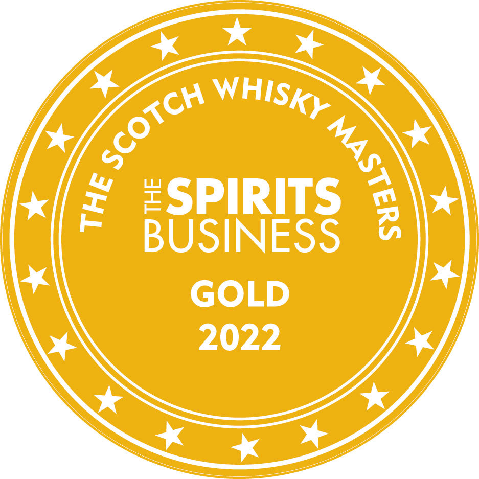 A round gold medal with stars along the edge. The text reads: &quot;THE SCOTCH WHISKY MASTERS&quot; at the top, &quot;THE SPIRITS BUSINESS&quot; in the center, and &quot;GOLD 2022&quot; at the bottom. This award-winning Glen Scotia 18 Year Old Single Malt Scotch Whisky makes an excellent gift for whisky enthusiasts.